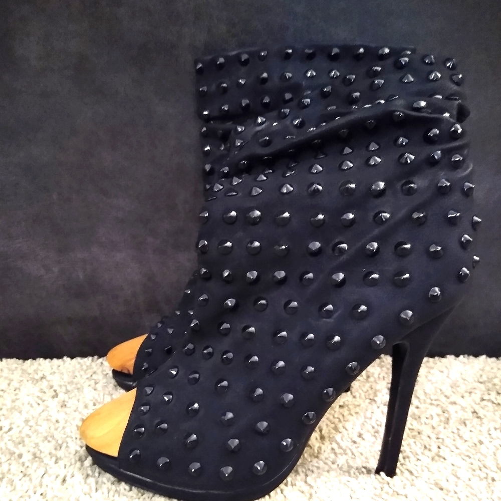 Black open toe booties with black spikes